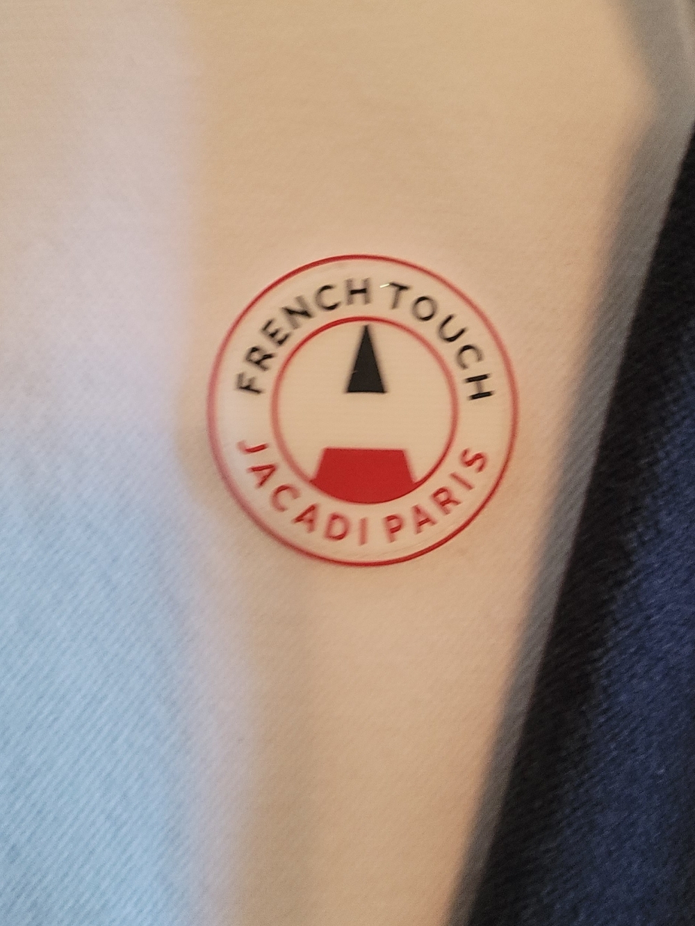 Jacadi White Jacket with Red and Navy Logo Patch